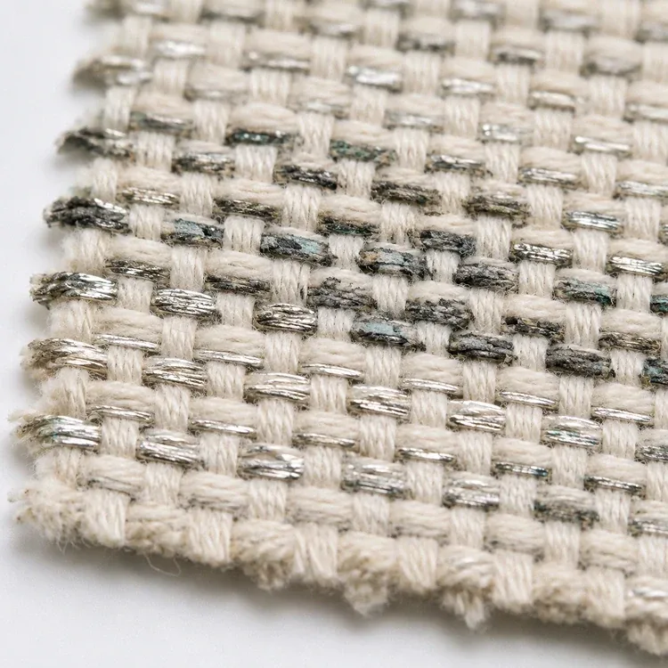 Close-up of silver thread fabric showing visible oxidation