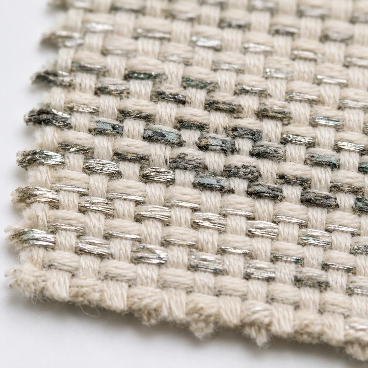 Close-up of silver thread fabric showing visible oxidation and discoloration on the conductive threads