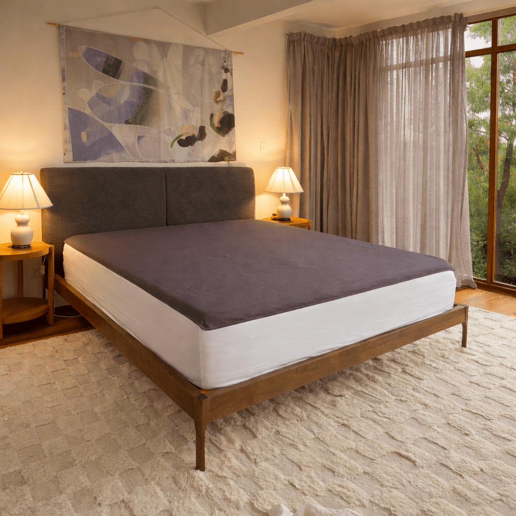 Premium Grounding stainless steel grounding sheet on a bed